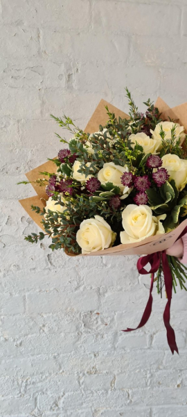 Half dozen white roses