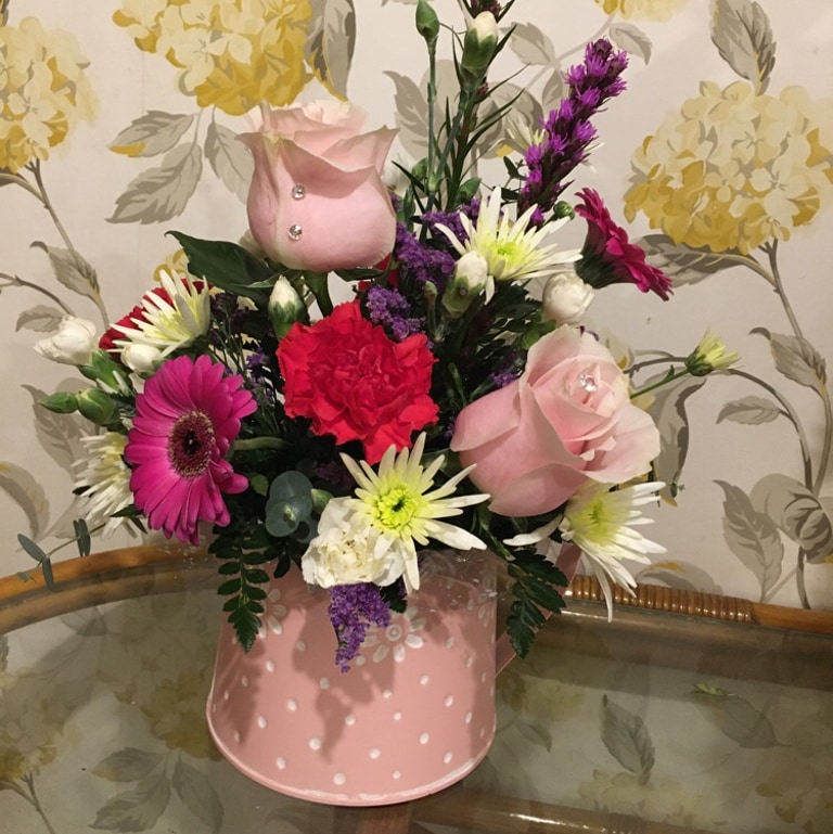 Daisy watering can