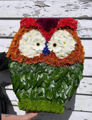 Floral owl tribute