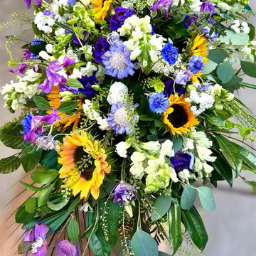 Meadow sunshine casket spray