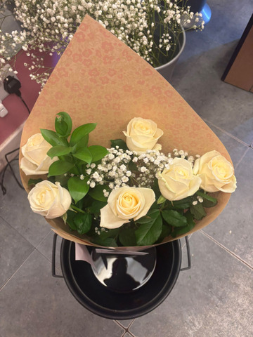 Six white roses