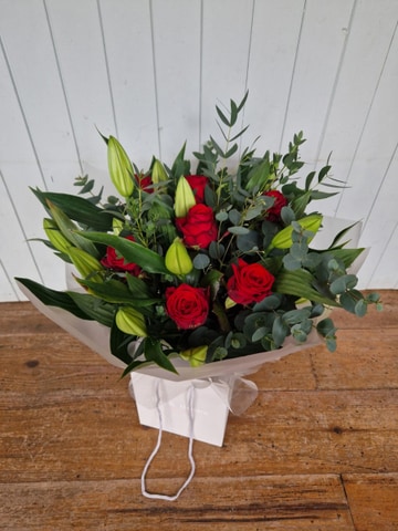 Red roses lillies