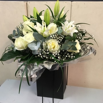 12 white roses and lilies