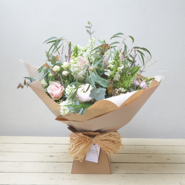 Handtied bouquet in water