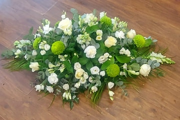 White and green casket