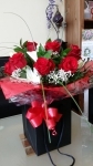 6 gift wrapped roses