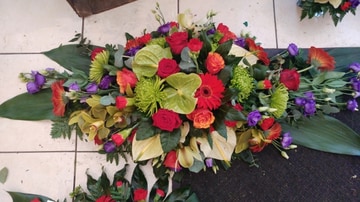 Vibrant casket spray