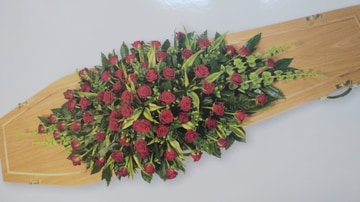 Red rose casket spray
