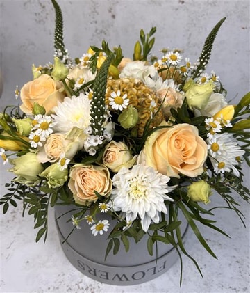 Hat box of flowers