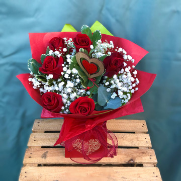 Six long stem red roses