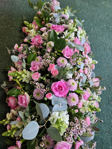 Pink funeral spray