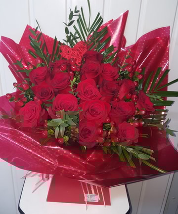 Loved with red roses