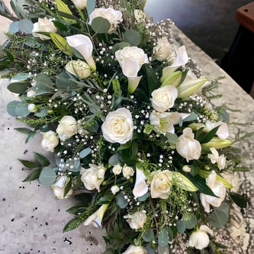 Roses lilies coffin