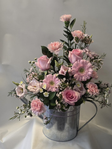 Pink watering can