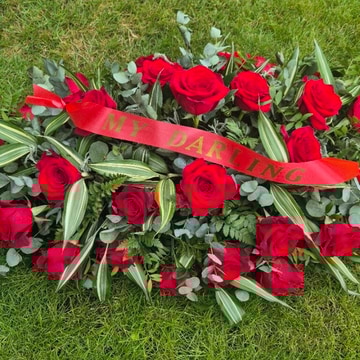 Red rose coffin spray