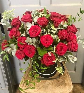 24 luscious red roses