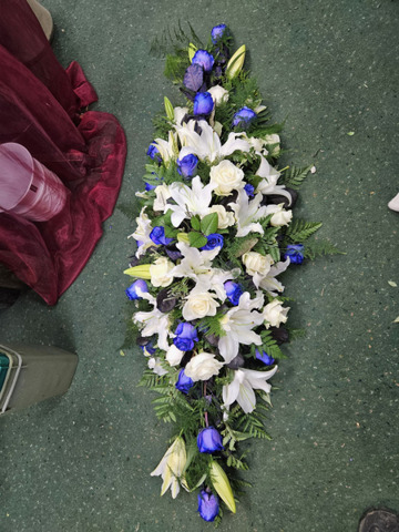 Blue-white lily spray