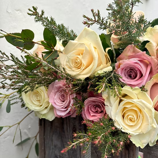 A dozen mixed roses