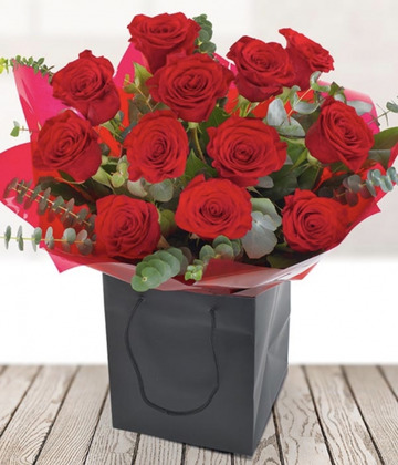 Twelve red roses