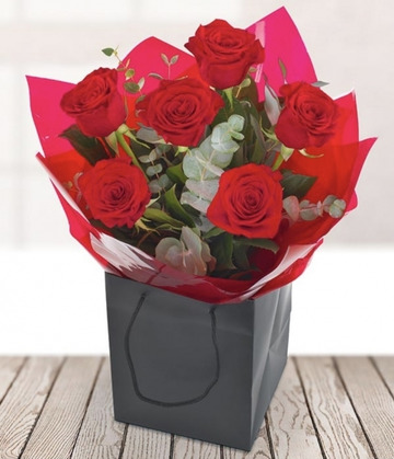 Six red roses
