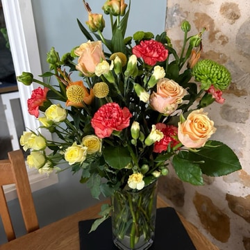 Seasonal florists choice in vase
