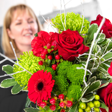 Christmas florist choice gift wrap of fresh festive blooms in red and green 2