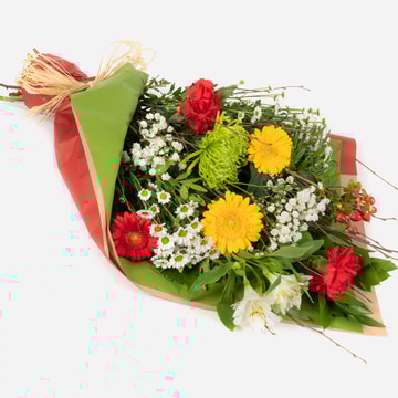 Christmas charm wrapped festive bouquet with seasonal flowers
