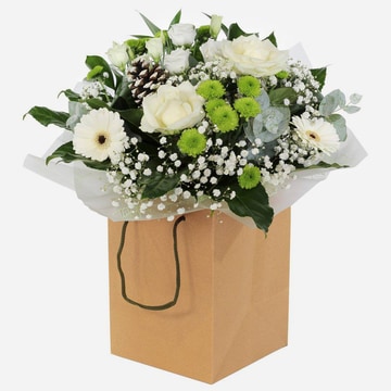 Blanket of snow hand tied bouquet with white and green blooms