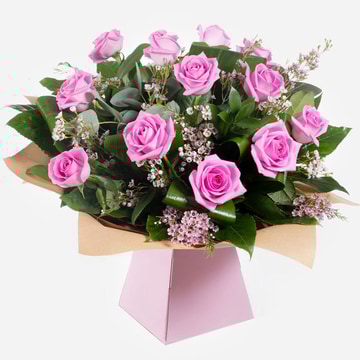 Dreamy dozen hand-tied bouquet of pink roses with lush foliage dreamy dozen hand tied bouquet of pink roses with lush foliage