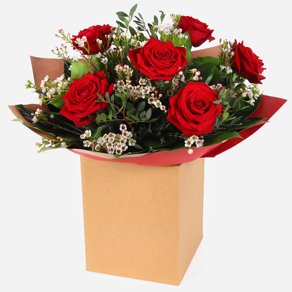 Six roses of romance bouquet with red roses and white filler in kraft gift box six roses of romance bouquet with red roses and white filler in kraft gift box