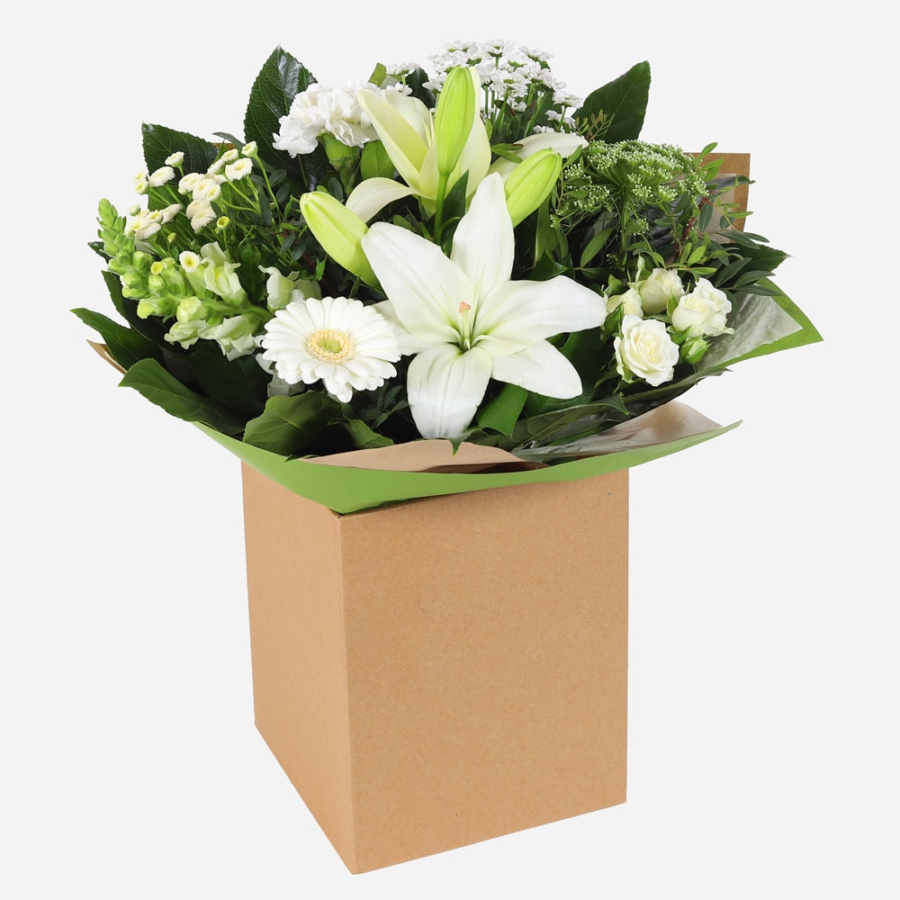 Classic harmony bouquet with white and green flowers in a kraft gift box