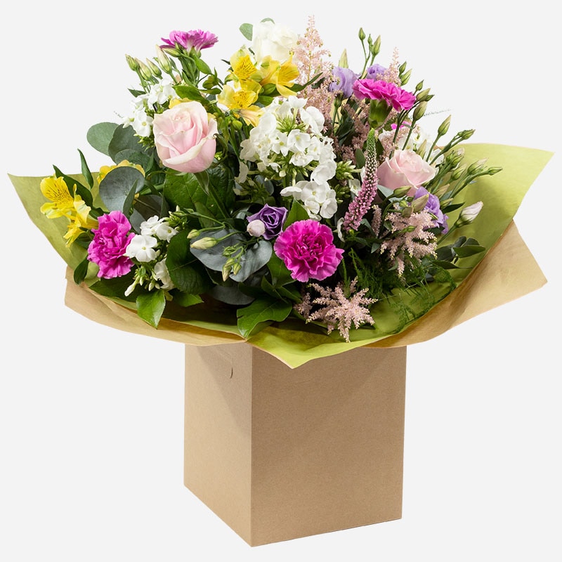 hidden-treasure-hand-tied-bouquet-with-pastel-roses-carnations-and-seasonal-mixed-blooms-1