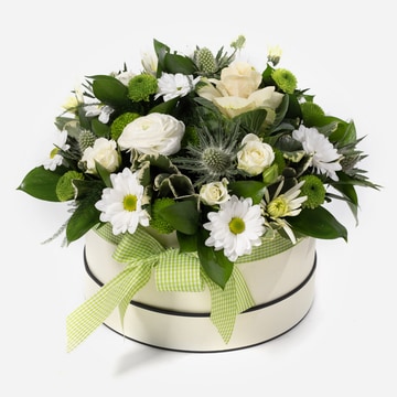 White and cream hat box arrangement with roses and gerberas