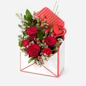 Red rose envelope flower arrangement with romantic heart detail