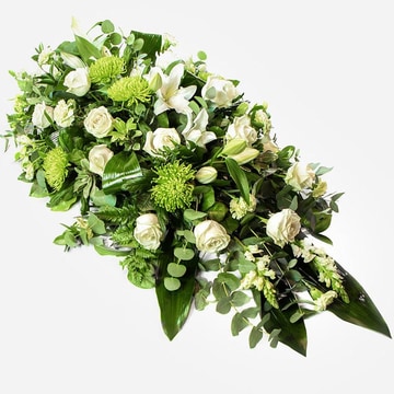 White and green double ended funeral spray with roses and lilies