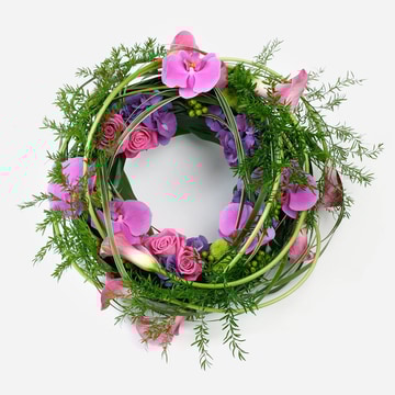 Eco friendly willow wreath with pink roses and purple hydrangea