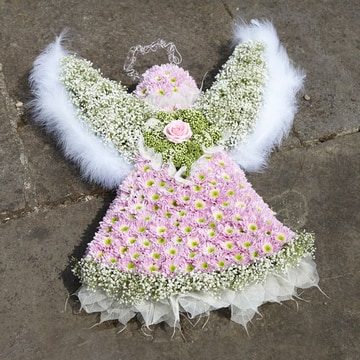 Angel floral tribute with pink roses and gypsophila