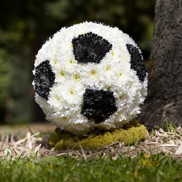 Football tribute with white chrysanthemums and black accents