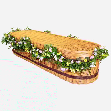 Willow coffin garland with pastel flowers and greenery