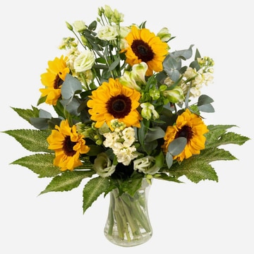 Sunny spells cheerful sunflower and white bloom arrangement in a clear glass vase 2