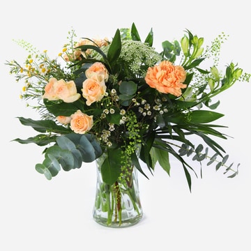 Vase of flowers in orange colours and foliage hand delivered by the local florist vase of flowers in orange colours and foliage hand delivered by the local florist vase of flowers in orange colours and foliage hand delivered by the local florist vase of f