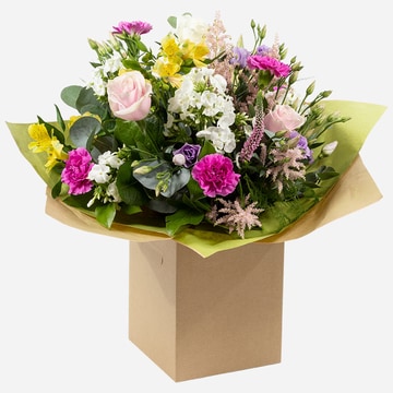 hidden-treasure-hand-tied-bouquet-with-pastel-roses-carnations-and-seasonal-mixed-blooms-1