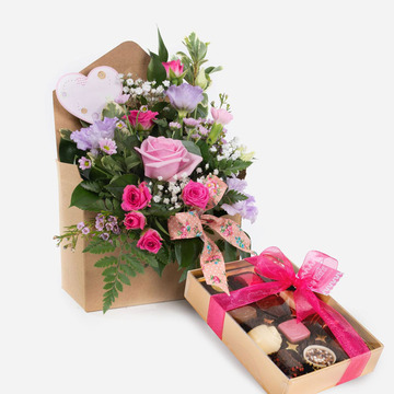 Candy hearts floral gift box with pastel blooms and assorted chocolates candy hearts floral gift box with pastel blooms and assorted chocolates candy hearts floral gift box with pastel blooms and assorted chocolates