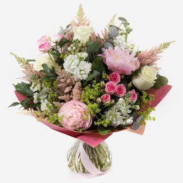 clouds-above-pastel-hand-tied-bouquet-with-peonies-and-roses-in-gift-wrap-1